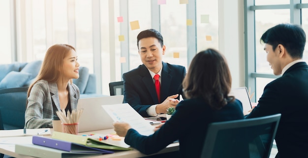 Group of business people meeting in board room