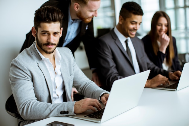 Group of business people sharing their ideas in the office