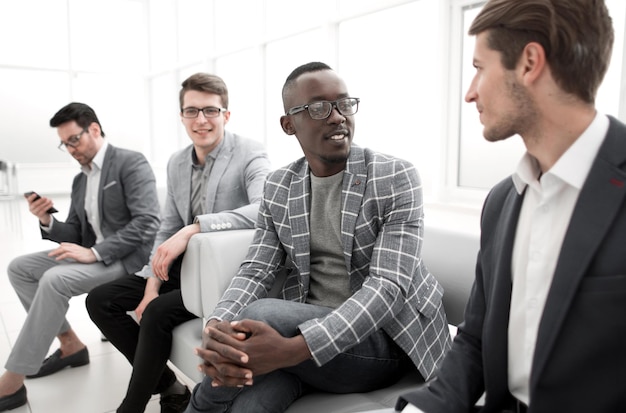 Group of business people sitting in the office corridorbusiness concept