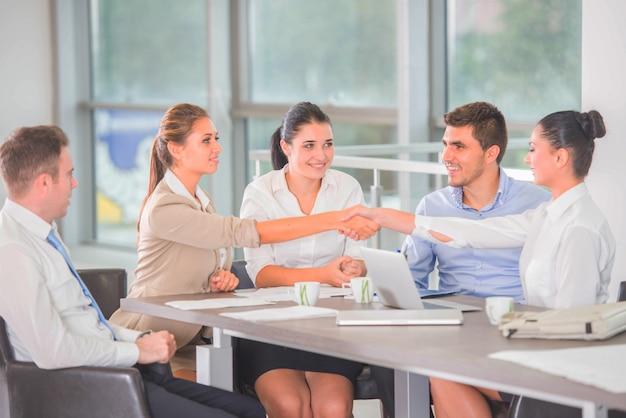 Group of business people sitting and talking