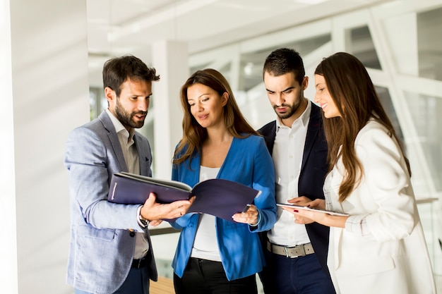 Group of business people who standing and discuss