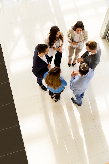 Group of business people who standing and discuss