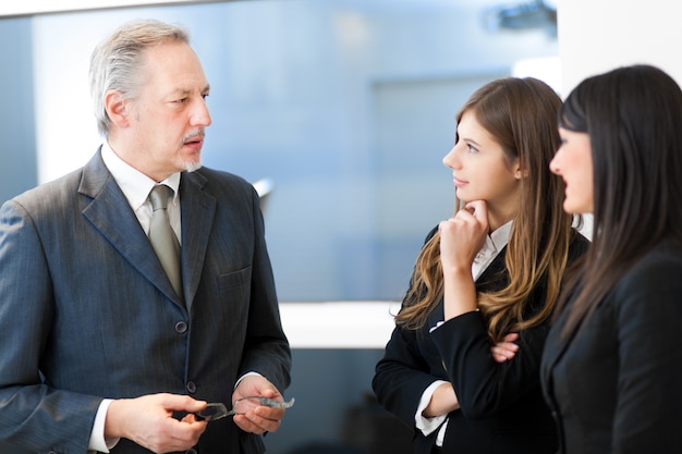 Group of business people at work in their office