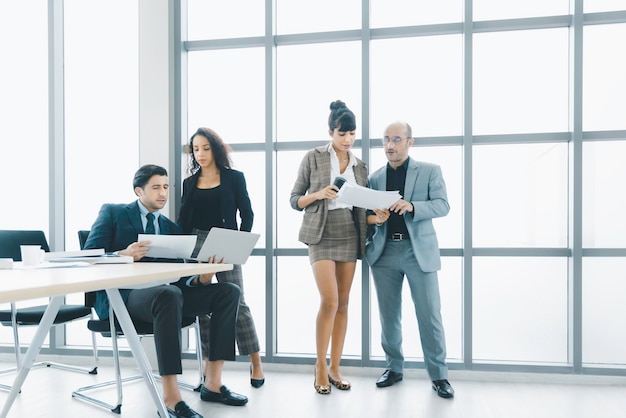 Group of business people working in modern office