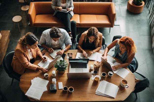 Group of business people working together in coffee shop