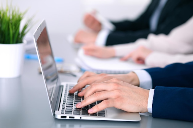 Group of business people working together in office