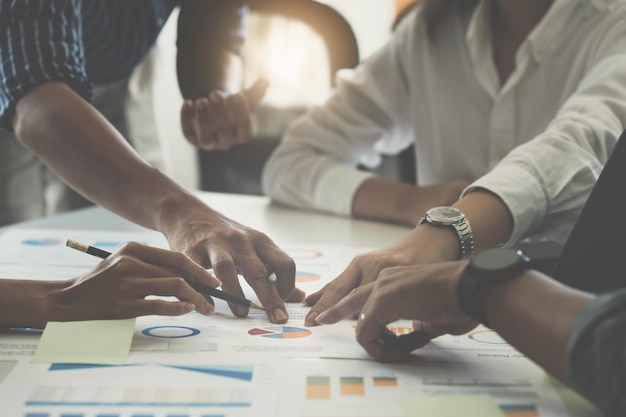 Group of business people working at workplace Business team hands at working with financial plan meeting discussion brainstorm with tablet on office desk