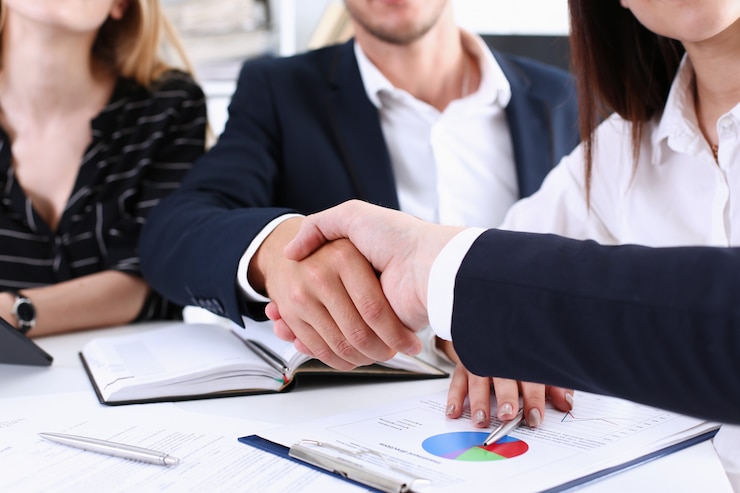 Photo group business peoples shake hands as hello in office closeup