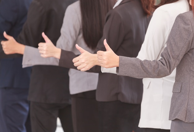 Group of Business team thump up