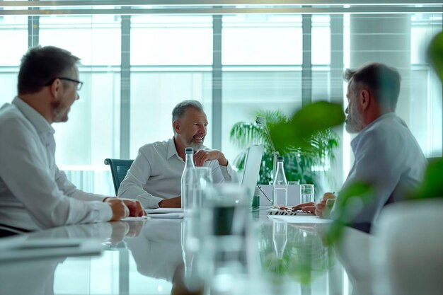 a group of businessmen sitting at a meeting table