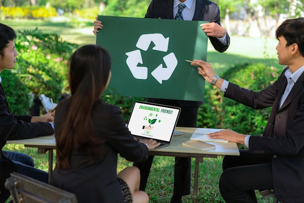 Photo group of businesspeople meeting at outdoor office with recycle gyre