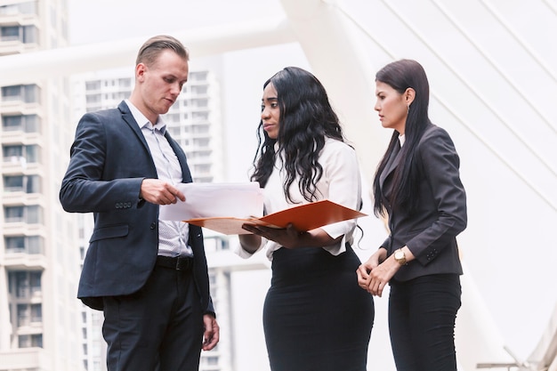 Group of businesspeople meeting together and discussing work