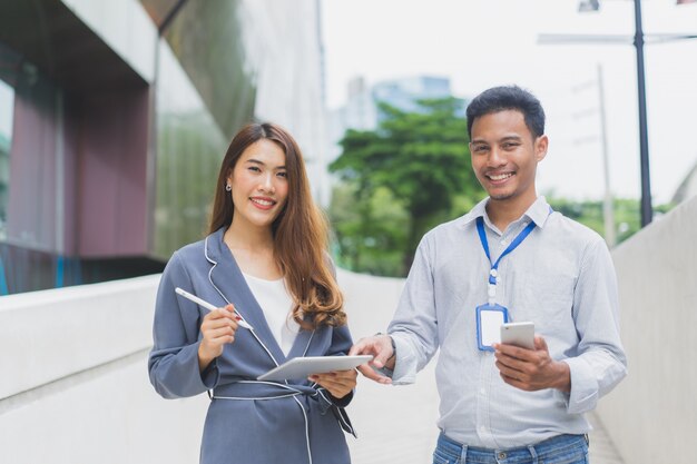 Group of businesspeople meeting together t outdoor