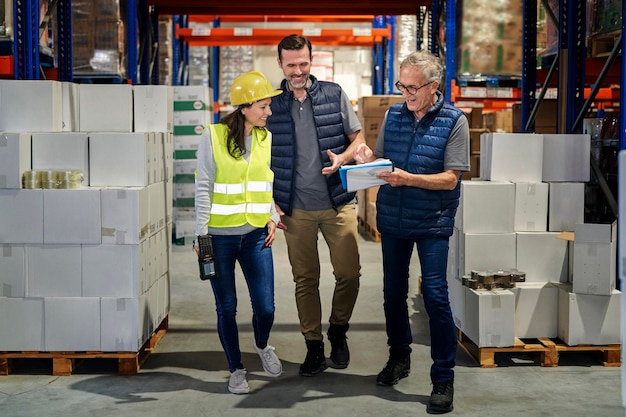 Group of caucasian people working at warehouse