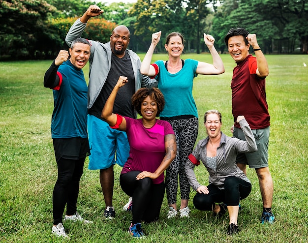 Group of cheerful diverse friends in the park