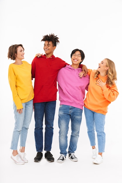 Photo group of cheerful teenagers isolated, laughing