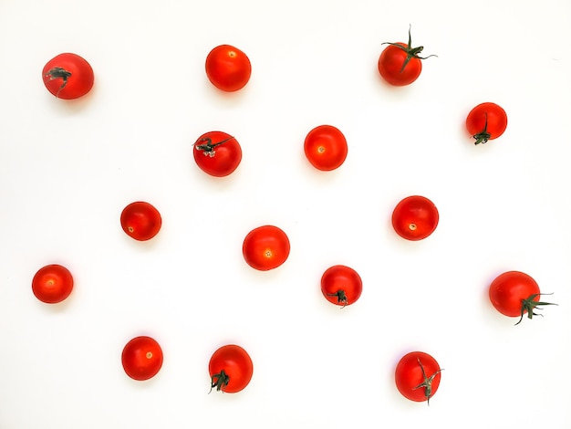 Group of cherry tomatoes on a white background tasty healthy food