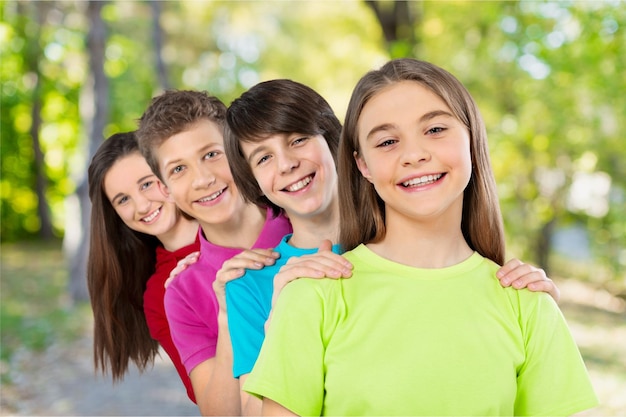 Group of children posing isolated in white