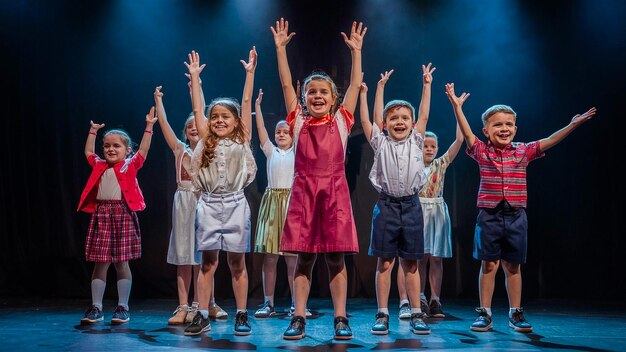 a group of children with their arms up in the air