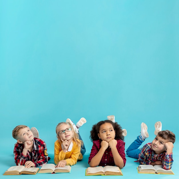 group of childrens with books