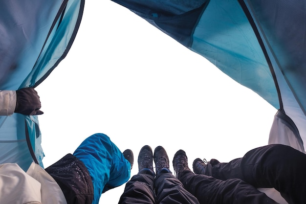 Group of climber are inside a tent with open on white background