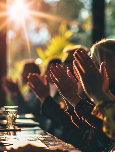 Photo a group of colleagues celebrating success and applauding together in a meeting room with lens flare