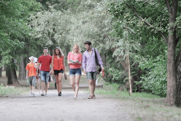 Group of College students walking together in the Park