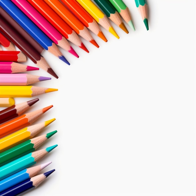 a group of colored pencils are lined up on a white background.