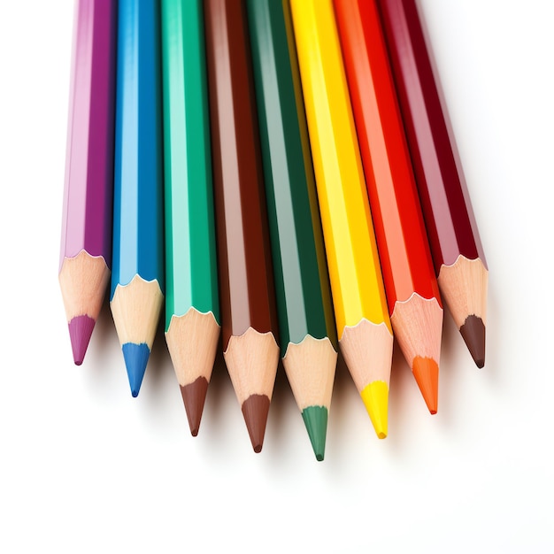 a group of colored pencils