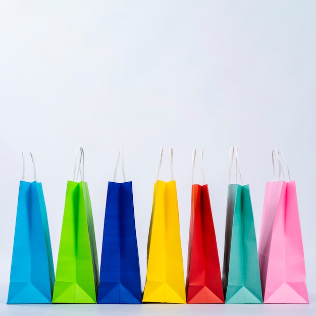 Group of colourful bags displayed in a row