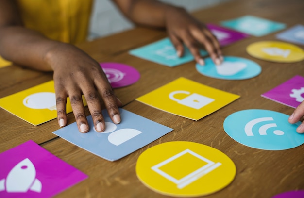 Group of computer icon on the wooden table