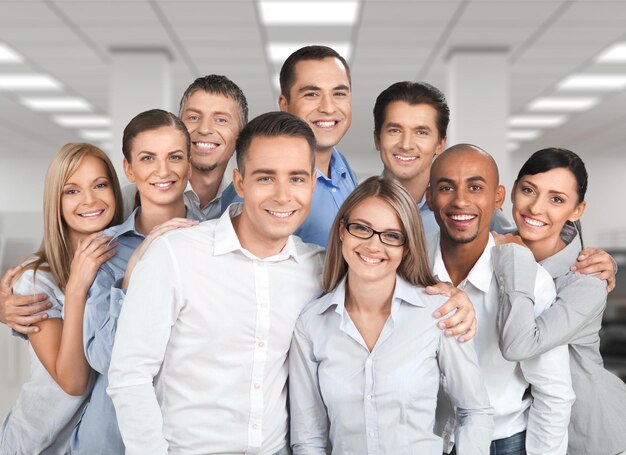 Group of confident businesspeople on light background