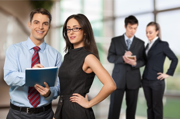 Group of confident businesspeople looking at camera