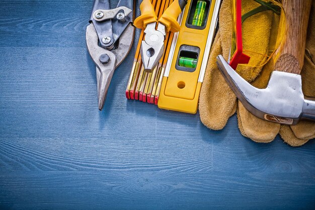 Group of construction equipment on wooden board