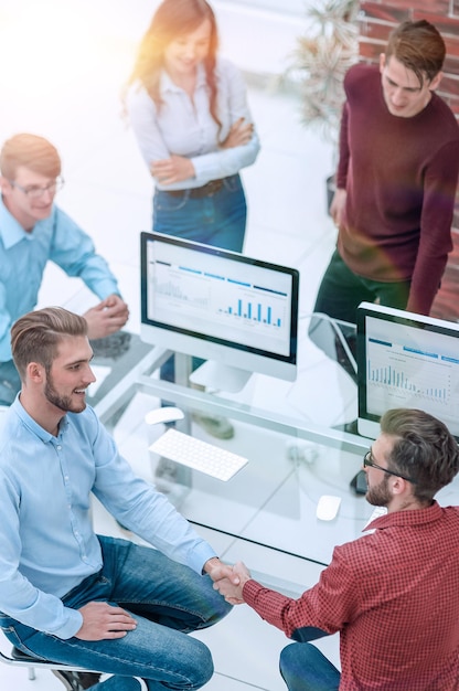 Group of creative business people having meeting in office