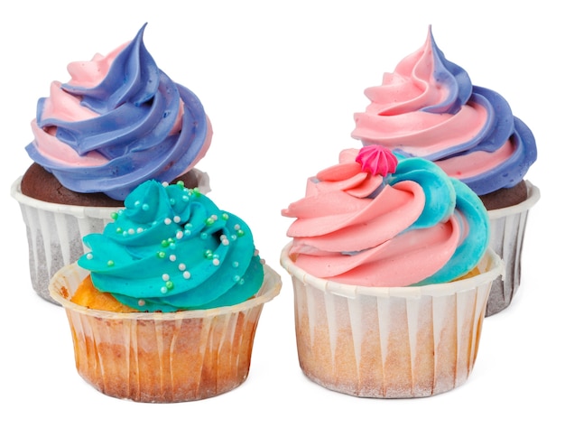 Group of cupcakes with colored topping isolated on white background