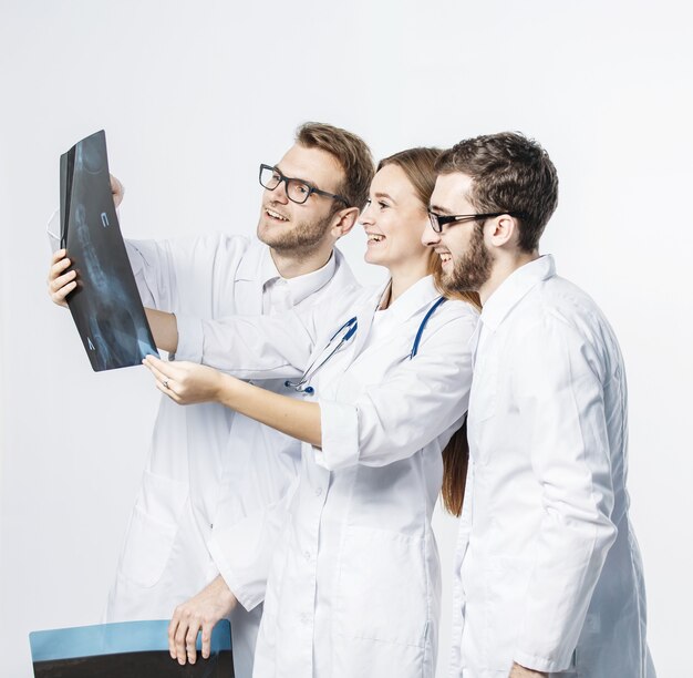 Group of diagnosticians with xrays