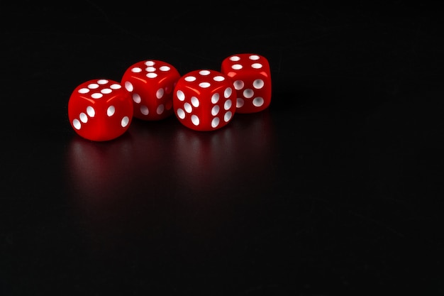 Photo group of dice close up on dark black background