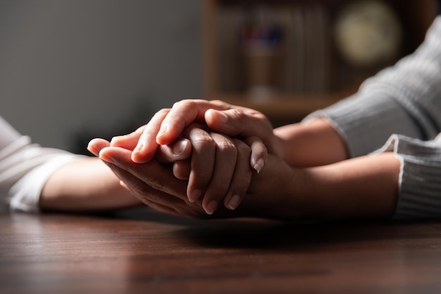 Photo group of different women praying together christians and bible study concept