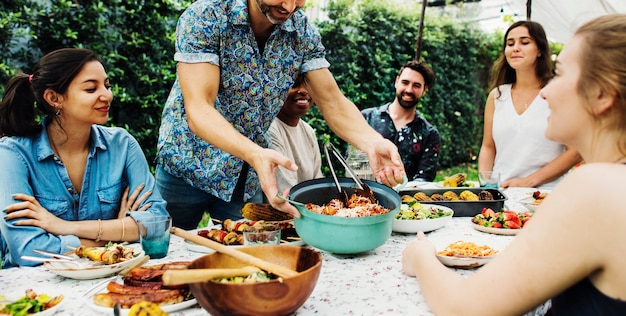 Group of diverse friends enjoying summer party together