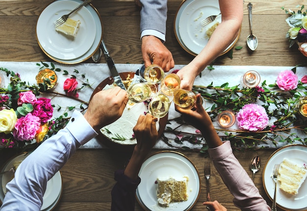 Group of Diverse Friends Gathering Clinking Glasses Together