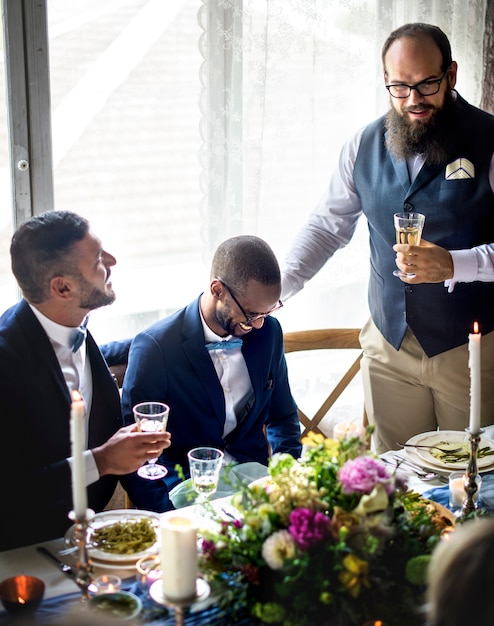Group of Diverse Friends Gathering Together Wedding Reception