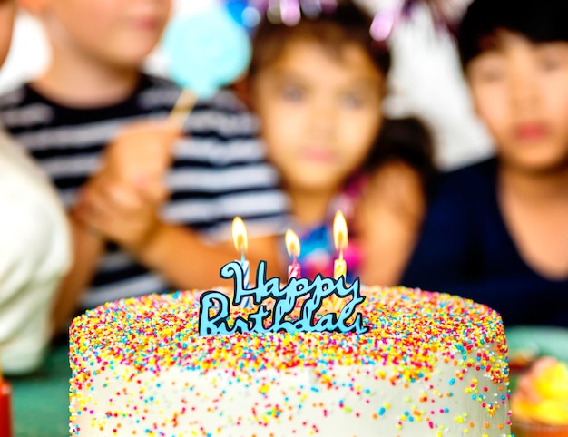 Group of diverse kids enjoying a bithday party