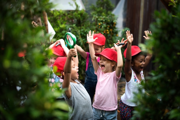 Group of Diverse Kids Hands Raising Up Cheerfully Together