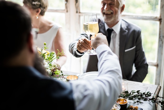 Group of Diverse People Clinking Wine Glasses Together