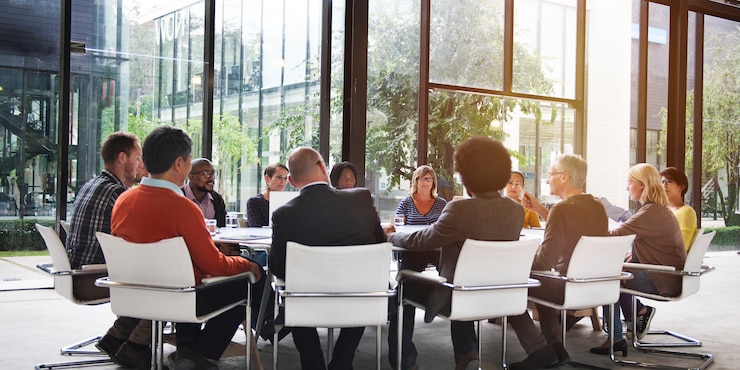 Photo group of diverse people having a business meeting