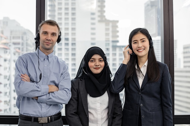 Group of diverse telemarketing customer service staff team in call center. Smiling of customer support operator at work.