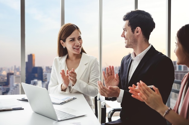 Group of diversity business people making handshake for teamwork and agreement concept at meeting room in office