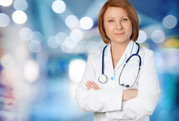 Group of doctors against white background