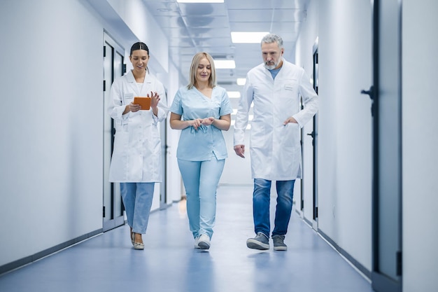 Group of doctors in the clinic corridor